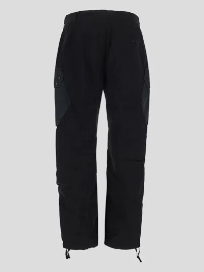 Shop Ten C Trousers In Black