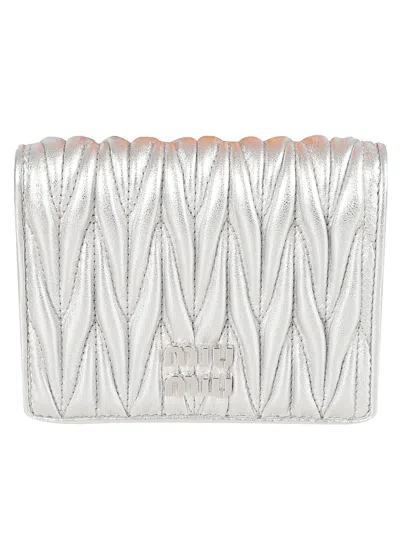 Shop Miu Miu Logo Buttoned Bifold Wallet In Silver