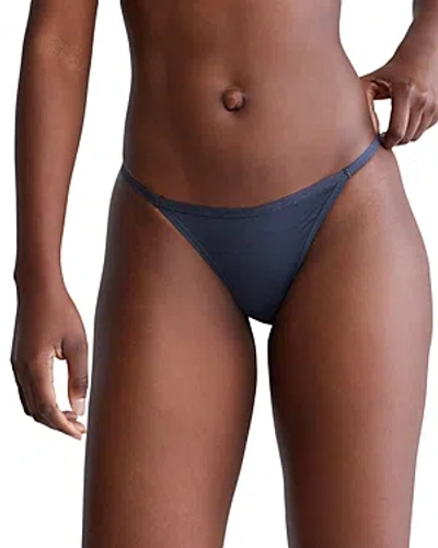 Shop Calvin Klein Ideal Micro Low Rise String Thong In Speakeasy