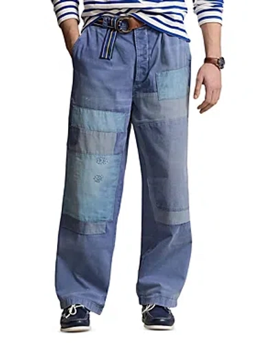 Shop Polo Ralph Lauren Relaxed Fit Distressed Pants In Blue