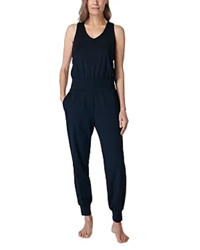 Shop Sweaty Betty Gaia Yoga Jumpsuit In Black