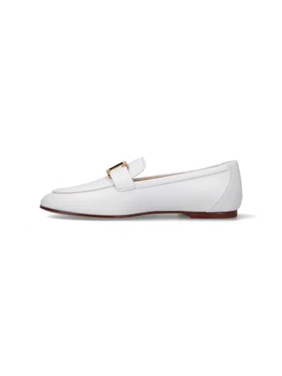 Shop Tod's Flat Shoes In White