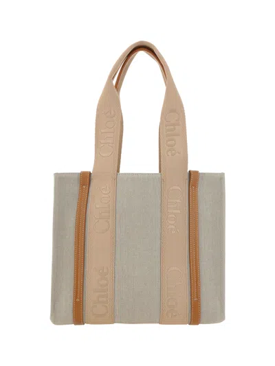 Shop Chloé Woody Handbag In Soft Tan