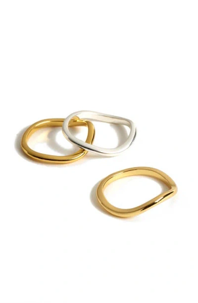 Shop Madewell Set Of 3 Wavy Stackable Rings In Pale Gold