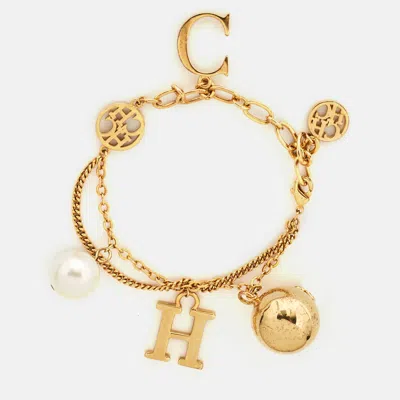 Pre-owned Carolina Herrera Ch Faux Pearl Gold Tone Charm Bracelet