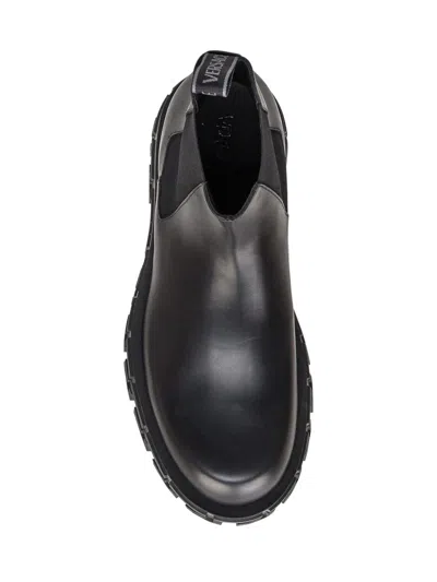 Shop Versace Greca Ankle Boot In Black