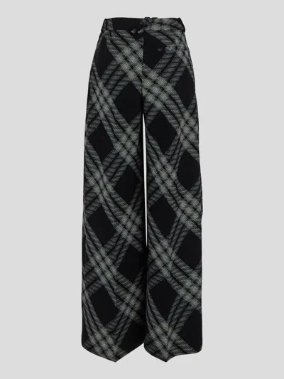 Shop Burberry Trousers In Monochrome