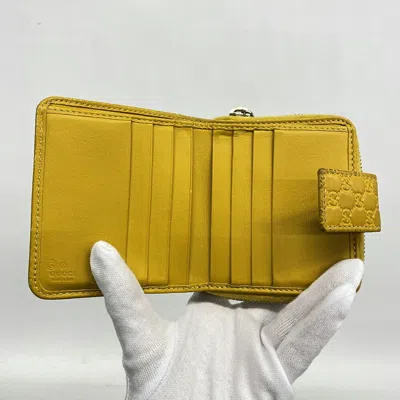 Shop Gucci Micro Ssima Yellow Leather Wallet  ()