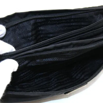 Shop Prada Saffiano Black Synthetic Clutch Bag ()