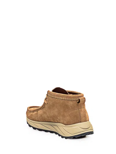 Shop Clarks Wallabee Boot In Brown