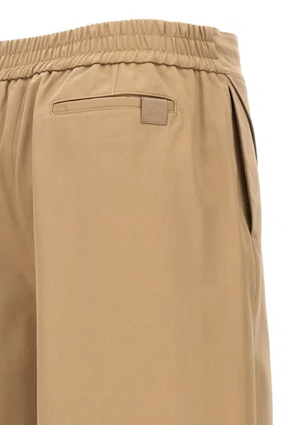 Shop Loewe Women Turned-up Crop Trousers In Cream