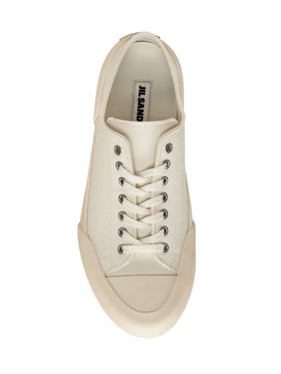 Shop Jil Sander Canvas Sneakers In White