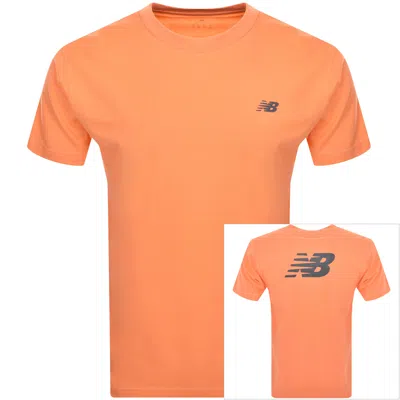Shop New Balance Sport Essentials Logo T Shirt Orange