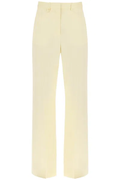 Shop Jacquemus Wide-leg Trousers In Yellow