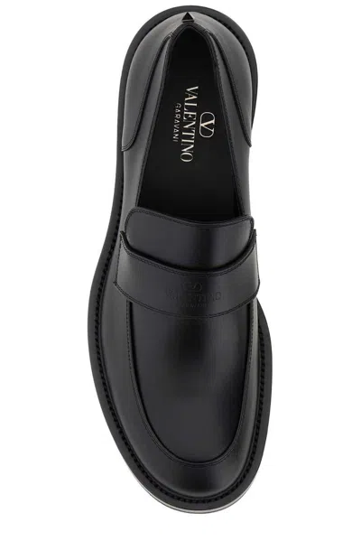 Shop Valentino Round Toe Slip-on Loafers In Nero