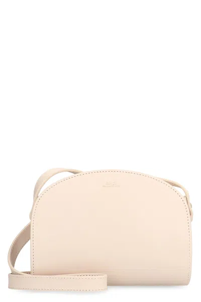 Shop Apc Demi-lune Mini Leather Crossbody Bag In Ivory