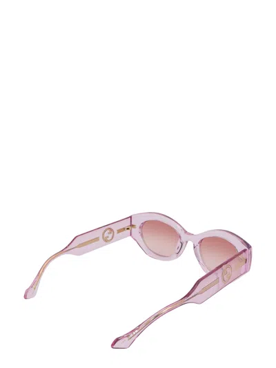 Shop Gucci Sunglasses In Pink