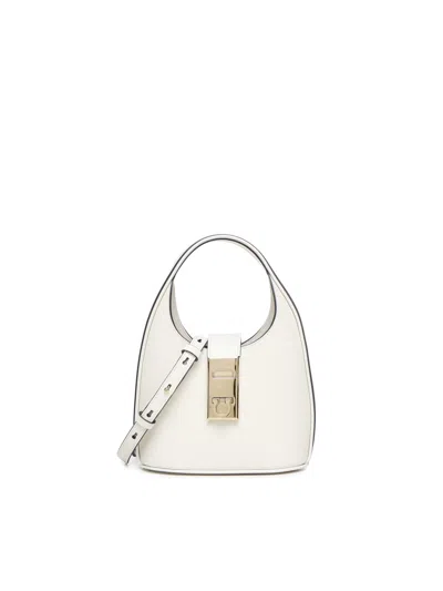 Shop Ferragamo Hobo Mini Bag With Gancini Buckle In White