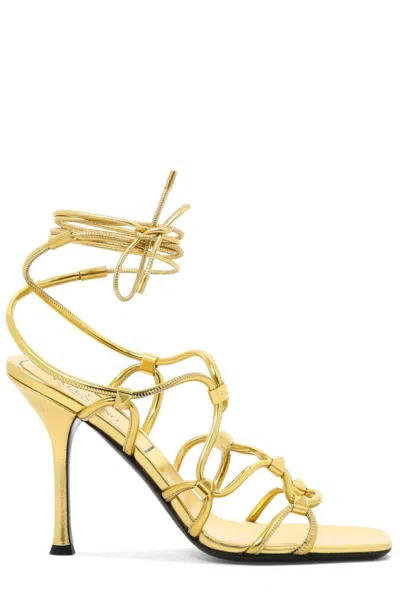 Shop Valentino Garavani Rockstud Net Open Toe Sandals In Golden