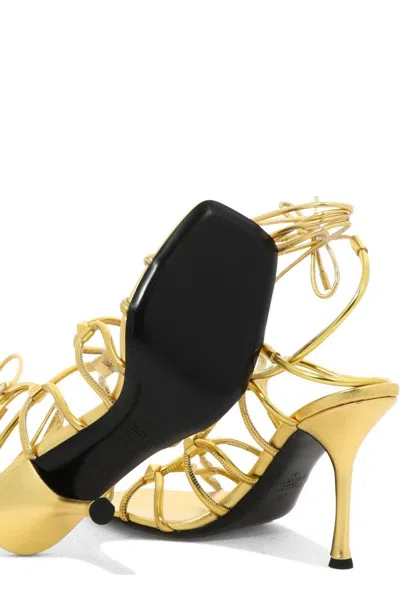 Shop Valentino Garavani Rockstud Net Open Toe Sandals In Golden