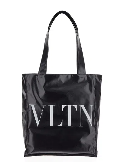 Shop Valentino Logo Printed Bag In Black