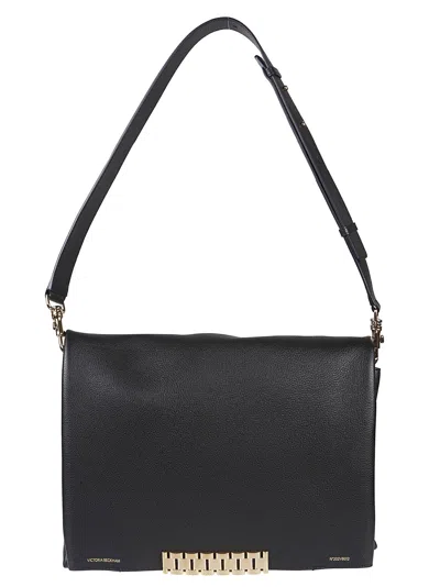 Shop Victoria Beckham Jumbo Chain Pouch Bag In Black