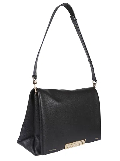 Shop Victoria Beckham Jumbo Chain Pouch Bag In Black