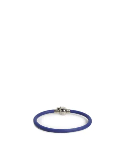 Shop Alexander Mcqueen Rubber Skull Bracelet In Blue