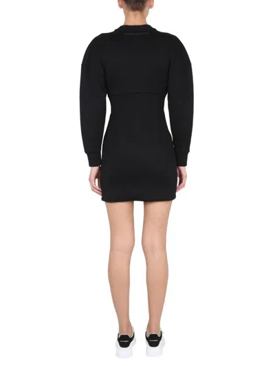 Shop Alexander Mcqueen Zipped Long Sleeved Dress In Black