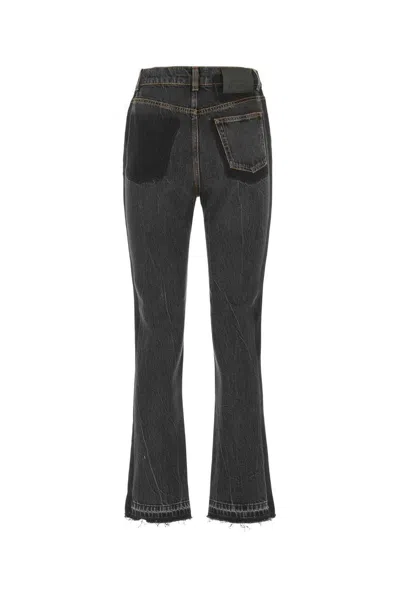 Shop Alexander Mcqueen Flared Denim Jeans In Black