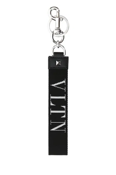 Shop Valentino Garavani Rockstud Logo Detailed Keyring In Black