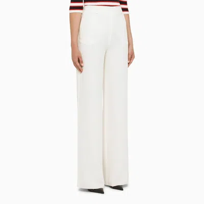 Shop Valentino Ivory Silk Palazzo Trousers In White