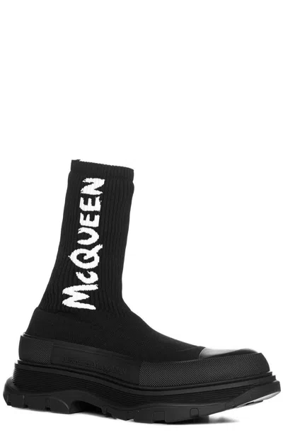 Shop Alexander Mcqueen Tread Slick Logo Intarsia Boots In Black