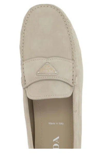 Shop Prada Logo Plaque Slip-on Loafers In Pomice