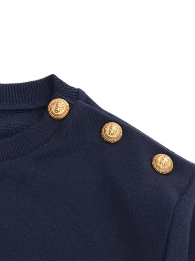 Shop Balmain Logo Printed Button-detailed Sweatshirt In Or