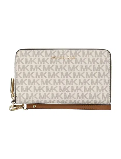 Shop Michael Kors Large Logo Smartphone Wristlet Wallet In Vanilla