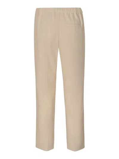 Shop Theory Elastic Waist Slim Trousers In Ivory