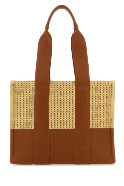 Shop Chloé Two-tone Raffia And Leather Medium Woody Shopping Bag In Marrone