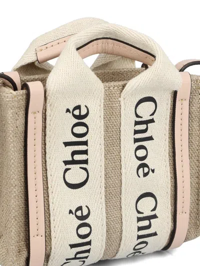 Shop Chloé Woody Micro Tote Bag In Bianco