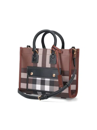 Shop Burberry Tote In Brown