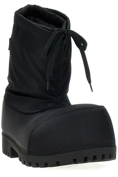 Shop Balenciaga Logo Patch Alaska Ankle Boots In Black