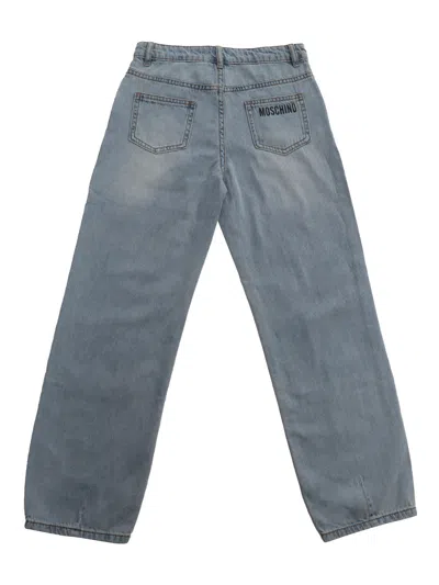 Shop Moschino Baggy Jeans In Light Blue