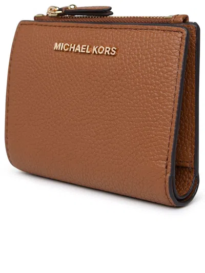 Shop Michael Kors Brown Jet Set Tumbled Leather Wallet In Luggage