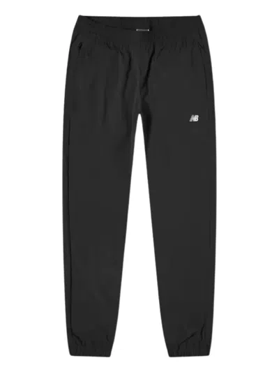 Shop New Balance Athletics Stretch Woven Jogger In Black