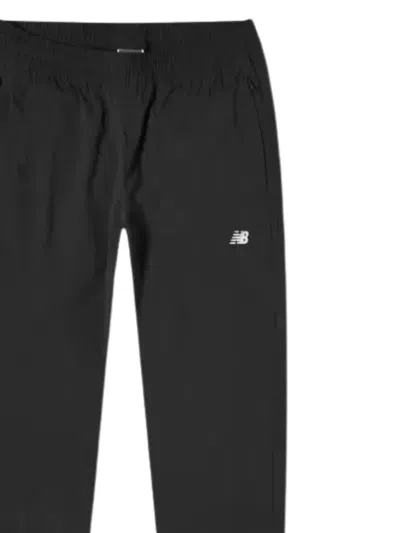 Shop New Balance Athletics Stretch Woven Jogger In Black