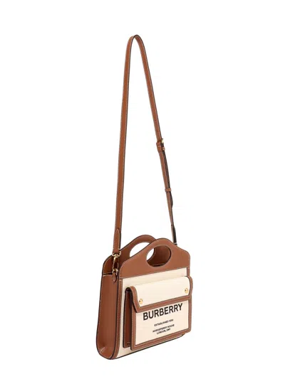 Shop Burberry Pocket Handbag In Natural/malt Brown