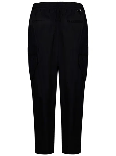 Shop Low Brand Trousers In Black