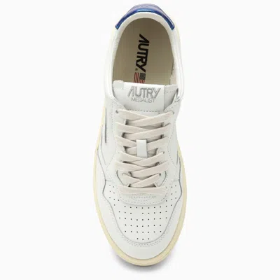 Shop Autry Medalist White\/metallic Blue Sneakers