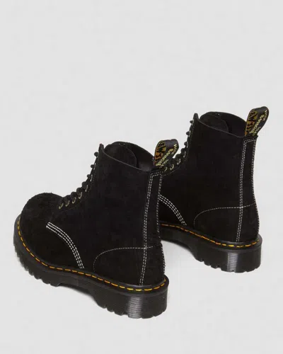 Dr. Martens Platform Boots With Treaded Sole And Distinctive Accents In Black
