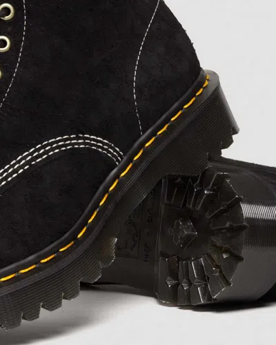 Dr. Martens Platform Boots With Treaded Sole And Distinctive Accents In Black